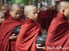 Monks at lunch in Mandalay, Burma