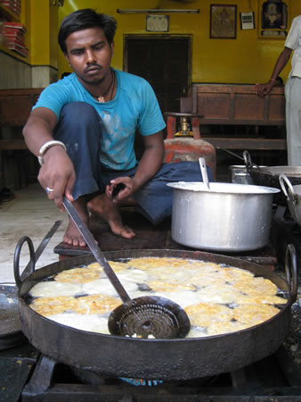 Vendor frying food