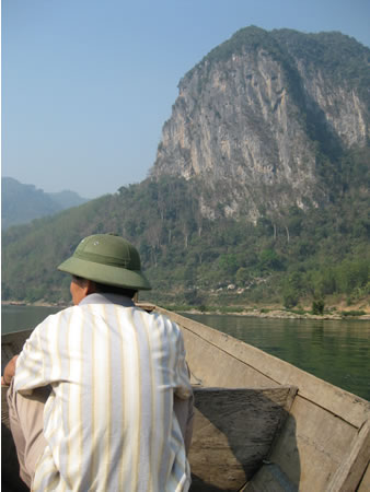 Man in boat near Mai Chau