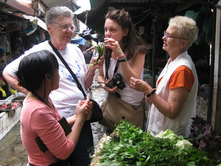 Women at market in Hanoi