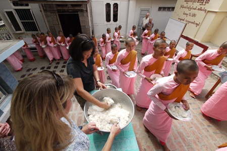 Tour participants serving lunch