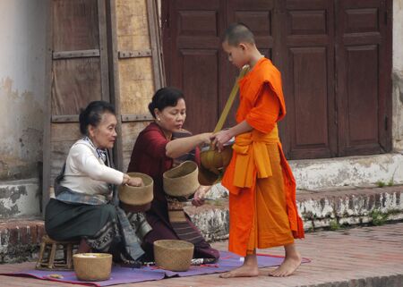 Laotian monk collecting alms